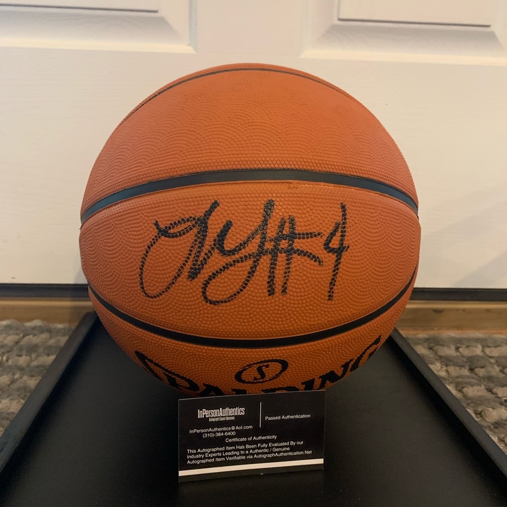 Signed Jalen Green. Unused ball with COA/Comes with glass casing.